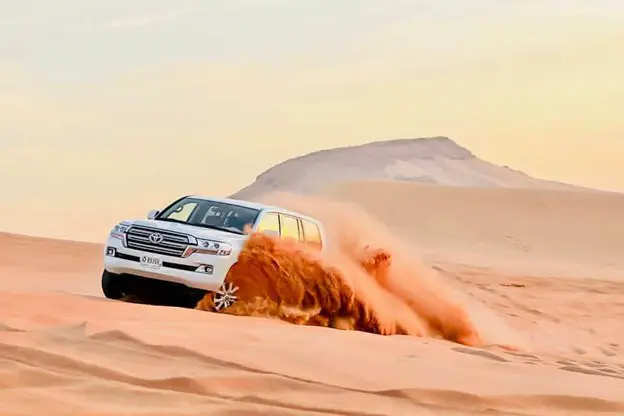 Arabian desert sand dunes at sunset